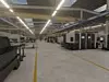 Computersimulation der neuen Produktionshalle: Mehr als 30 Bearbeitungszentren sind in der Halle vorgesehen. Bild: Vogelsang