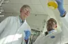 SCIENTISTS AT WORK IN GROTON-NEW LONDON LABORATORIES