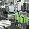 Automatic assembly line for lithium batteries. Robotic packaging with pneumatic grippers. 3d render