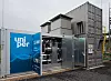 Hochtemperatur-Wärmepumpenanlage von Uniper und Evonik in Containerbauweise auf einem Industriegelände.